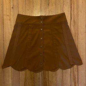 Burnt orange button down skirt.